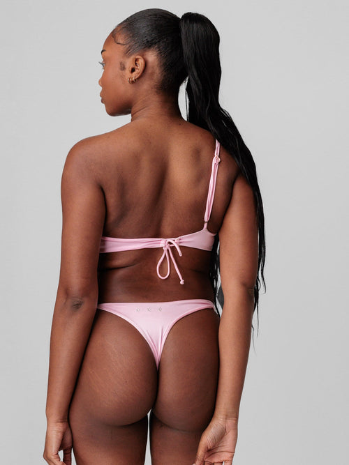 Arista Asymétrique bandeau Plumeria (Rose)
